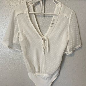 Abercrombie White dotted body suit